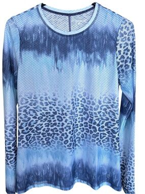 Women's long sleeve Sofibella sports top. Can order matching skort and tops.